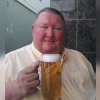Barry, 63 Barry 63 meme character depicting a British man with a pint of beer in his hand smiling at the camera.