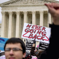 2022 Supreme Court Overturning of Roe v. Wade Leaked Roe v. Wade Document 2022, Supreme Court Leak, an image of protestors outside the supreme court building in Washington dc.