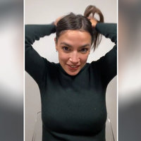 AOC Tying Her Hair AOC Tying Hair / AOC Ponytail meme.