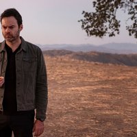 Bill Hader, in a shot from "Barry" looking glum in the desert.