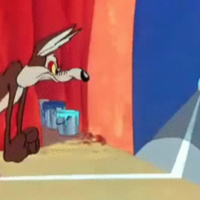 Looney Toons Painted Tunnel On A Wall Gag depicting wile e coyote.