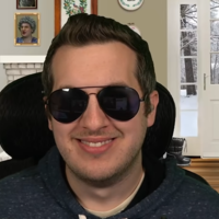 Kitboga during one of his livestream shows with a virtual background.