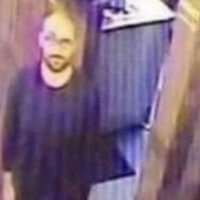 Vsauce Michael Staring meme depicting a man staring up at a security camera.