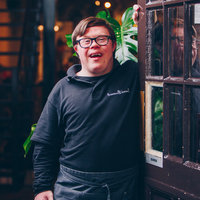 Brownies and Downies photo of the cafe in the Netherlands with an employee standing in the doorway.