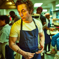 Carmy In The Kitchen meme depicting Carmen "Carmy" Berzatto (Jeremy Allen White) from Hulu's The Bear cooking in the kitchen.