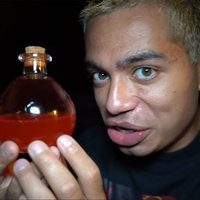 Among Us Potion being held up to the camera.