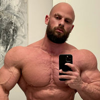 Joey Swoll bathroom mirror selfie.