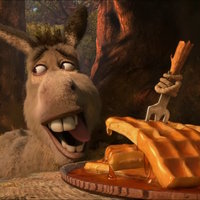 Donkey Reaching for Waffles meme from shrek.