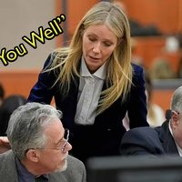 Image of Gwyneth Paltrow whispering.