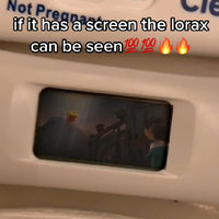 If It Has a Screen the Lorax Can Be Seen social media video example watching the movie on a pregnancy test.