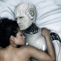 We'll Be Having Sex With Robots in the Next 10 Years An image of a naked woman cuddling with an android in bed.