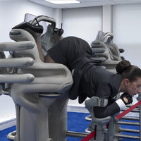 Continental Breakfast Chair meme and art installation depicting a woman in a downward facing position.