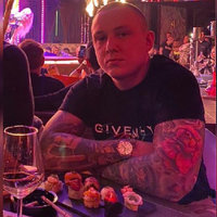 A photo of Joe Lampton / Vlad Obu / MrLottaHoes sitting in front of a plate of food.