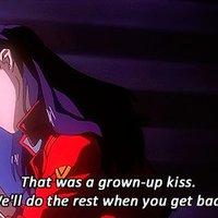 misato gives shinji a grown-up kiss