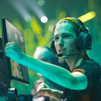 A photo of professional gamer Jake boaster Howlett playing valorant at a tournament.