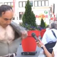 Steve Spiros Steve Spiros opening his shirt during an interview from the viral video.