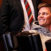 Tom Brady Smiling Reaction meme.