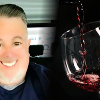 An image depicting That Wine Guy and a glass of wine.