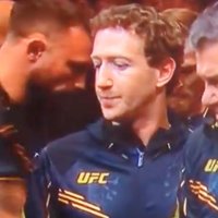 Mark Zuckerberg, in a UFC jacket at a UFC event