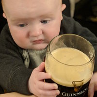 Baby With a Guinness Glass meme.