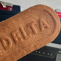Goyblock meme depicting an image of someone holding a delta biscoff cookie on a plane.