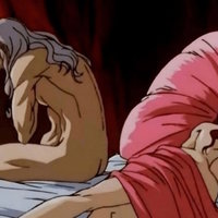 Naked Griffith Sitting in Bed