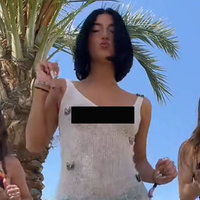Charli D'Amelio Coachella Dress Controversy depicting the influencer wearing a censored see-through dress.