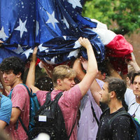 UNC-Chapel Hil Frat Boys defending American Flag / Pi Kappa Phi Men Defended Their Flag. Throw ’Em a Rager image from viral video.