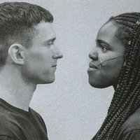 tom holland and francesca amewudah-rivers staring at each other as Romeo and Juliet