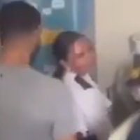 HMP Wandsworth prison guard and inmate screenshot from the viral video.