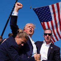 Donald Trump Raised Fist Photograph Donald Trump Raised Fist Photograph and meme depicting the former president's image post-assassination attempt.
