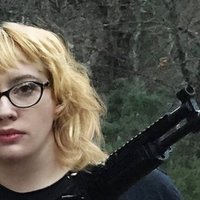 Sam Hyde Is The Shooter Hoaxes Sam hyde shooter meme depicting sam hyde wearing a black shirt holding a gun.