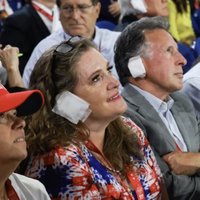 Trump Supporters Wearing Ear Bandages A group of Trump supporters wearing bandages over their right ears at the 2024 RNC.