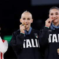 Chinese Gymnast Zhou Yaqin Biting Medal Chinese Gymnast Zhou Yaqin Biting Medal meme depicting the athlete and two olympians from the 2024 summer olympics.