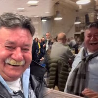 Man Laughing at a Whistle