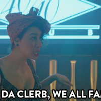 In Da Clerb We All Fam meme depicting Ilana Glazer from Broad City.