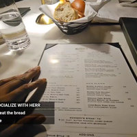 Kick Streamer DumbDumbJeez Dine and Dash Controversy An image of dumbdumbjeez with his hand on a menu from his dine and dash stream.