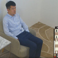Ding Chilling Ding Chilling meme depicting chess grandmaster Ding Liren sitting alone in a room.