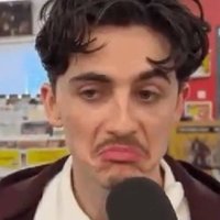 Timothee Chalamet Frowning / Considering