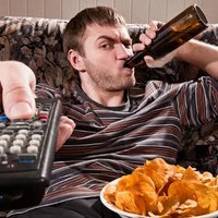 Guy Sipping Beer on a Couch Stock Image Guy Sipping Beer on a Couch meme.
