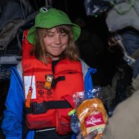 Greta Thunberg Smiling At Sandwich meme.