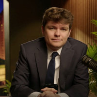 An image of Nick Fuentes from his podcast show.