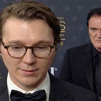 Quentin Tarantino Standing Behind Paul Dano meme.