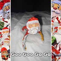 Goo Goo Gaga Santa meme and image examples.
