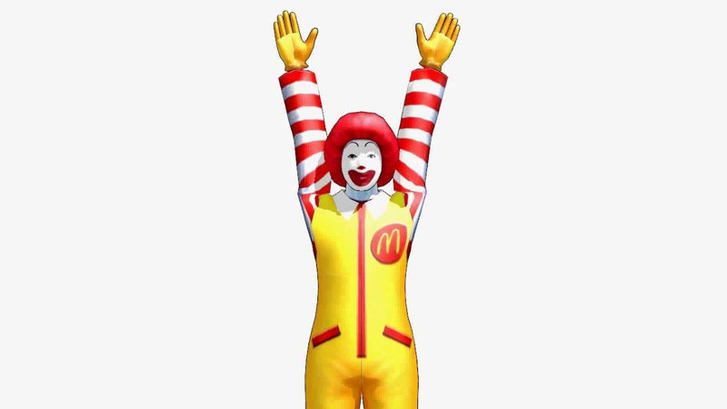 McDonald's "Ran Ran Ru" Commercials showing Ronald McDonald with his arms reached upward.