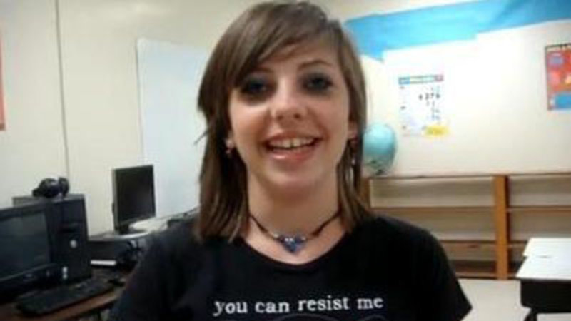 Jessi Slaughter 11 year old cyberbullying victim in an apology video filmed in a classroom wearing a black t-shirt and heavy eye makeup