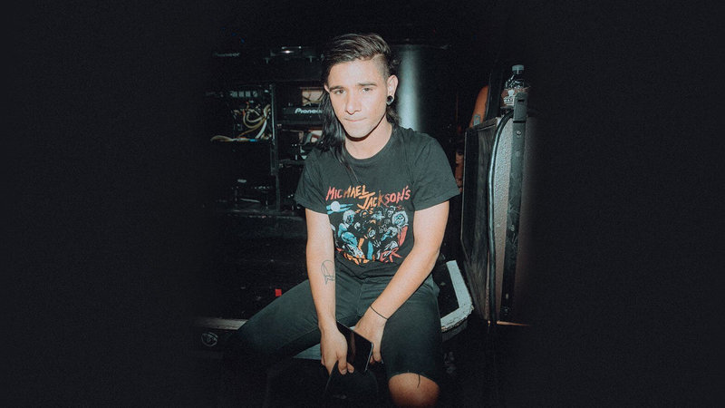 Skrillex sitting 