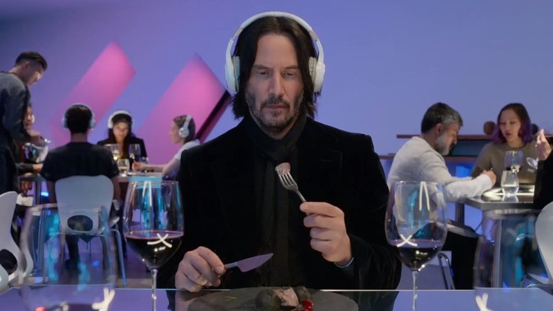 Keanu Reeves Dining in Headphones