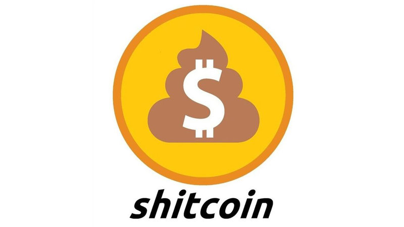 Shitcoin slang term remade into the Bitcoin logo with a poop emoji to describe the cryptocurrency.