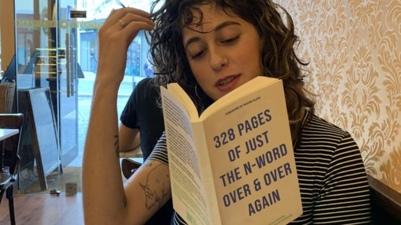 Girl Reading N-Word Book Girl Reading N-Word Book